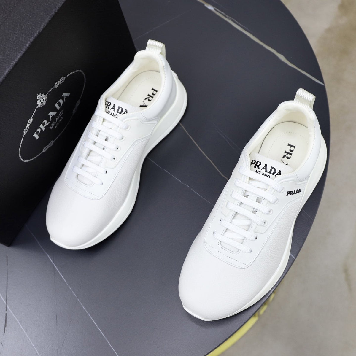 Prada Textured Low-Top Sneakers